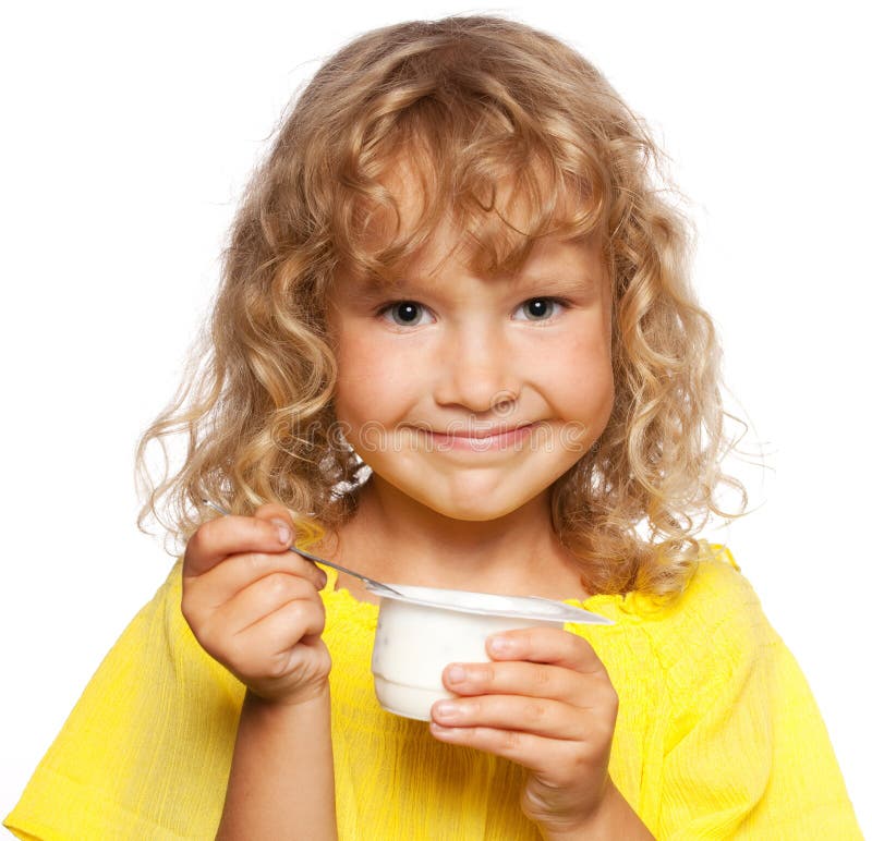Little girl eating yogurt
