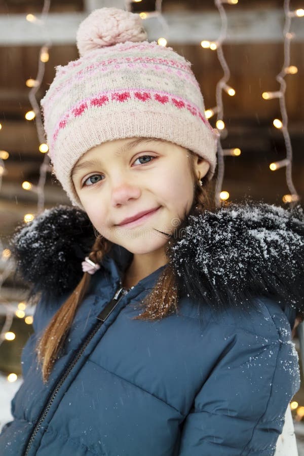 Little Girl Enjoying Holidays. Portrait Kid on Dark Background with ...