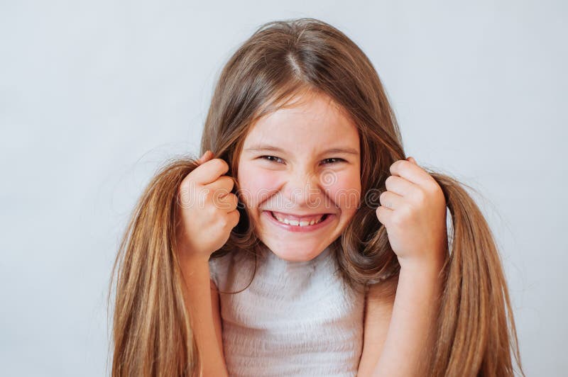 Little Girl Face Portrait in Girl Child Brush Hair in Fashionable Dress ...