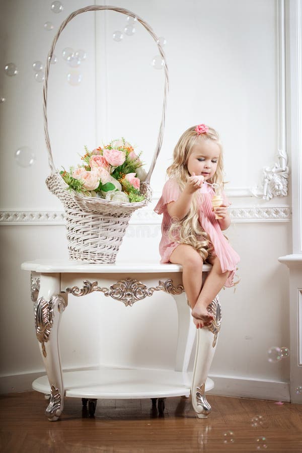 Little girl in a fashionable luxury interior