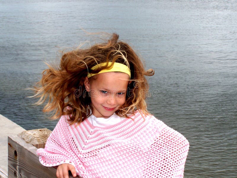 Little girl on fishing dock