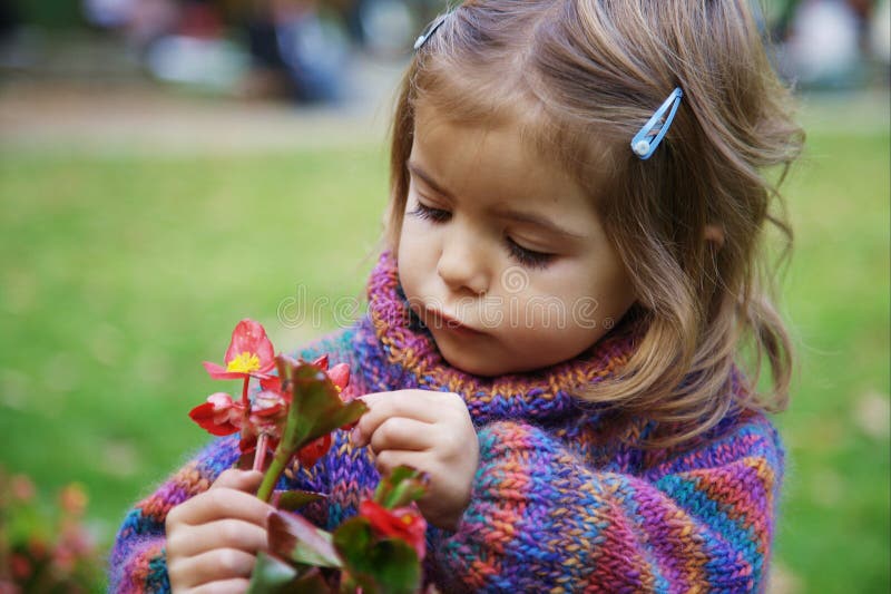 Little girl with a flower