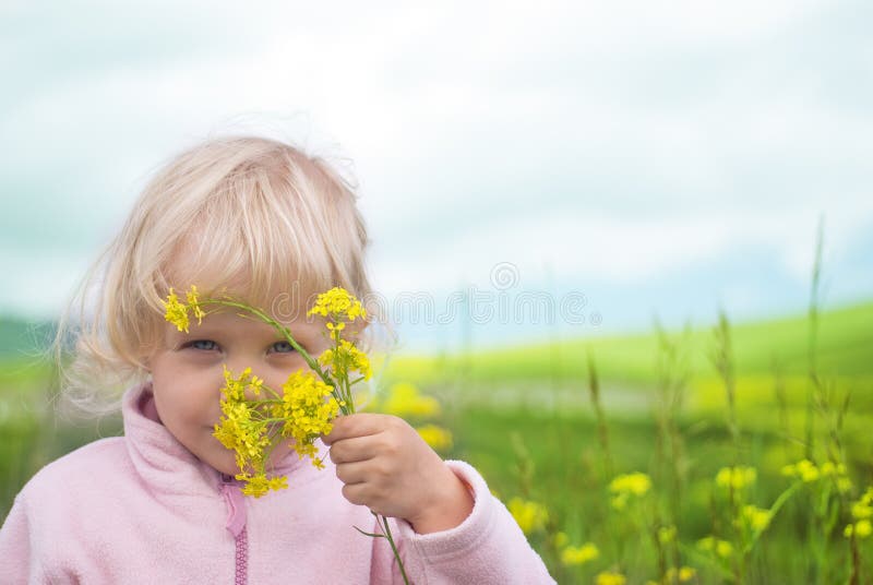 Little girl flower in field