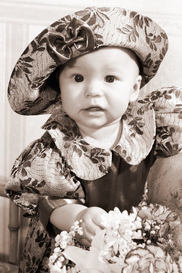 Little girl with flowers