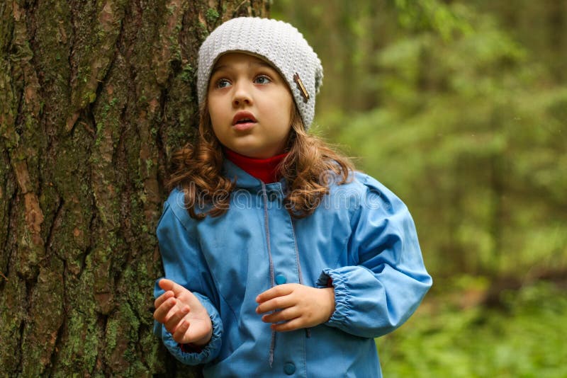 Little Girl In Forest.