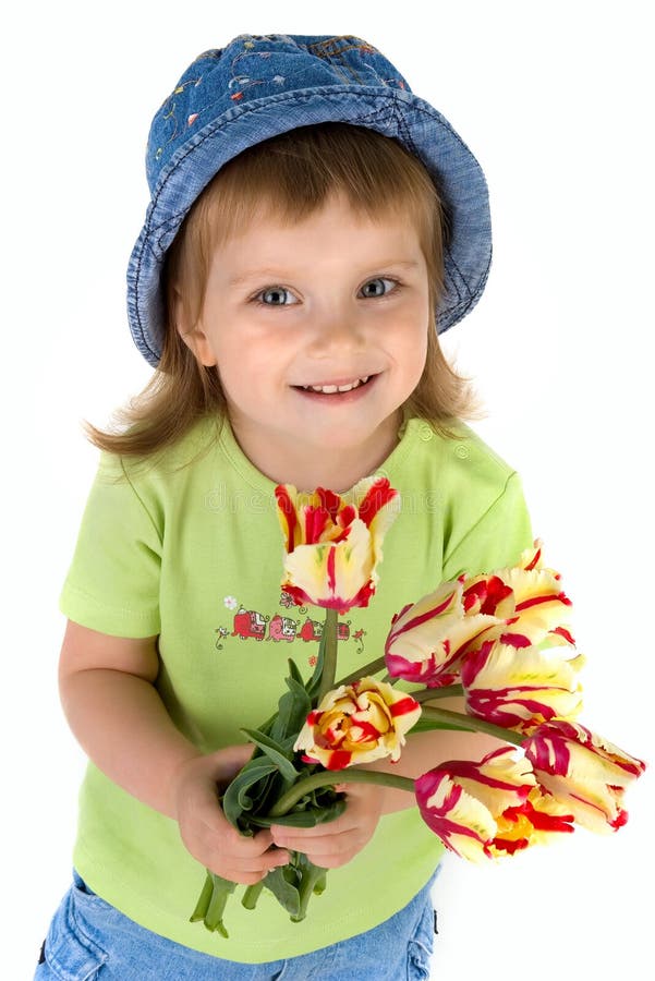 Little girl giving tulips