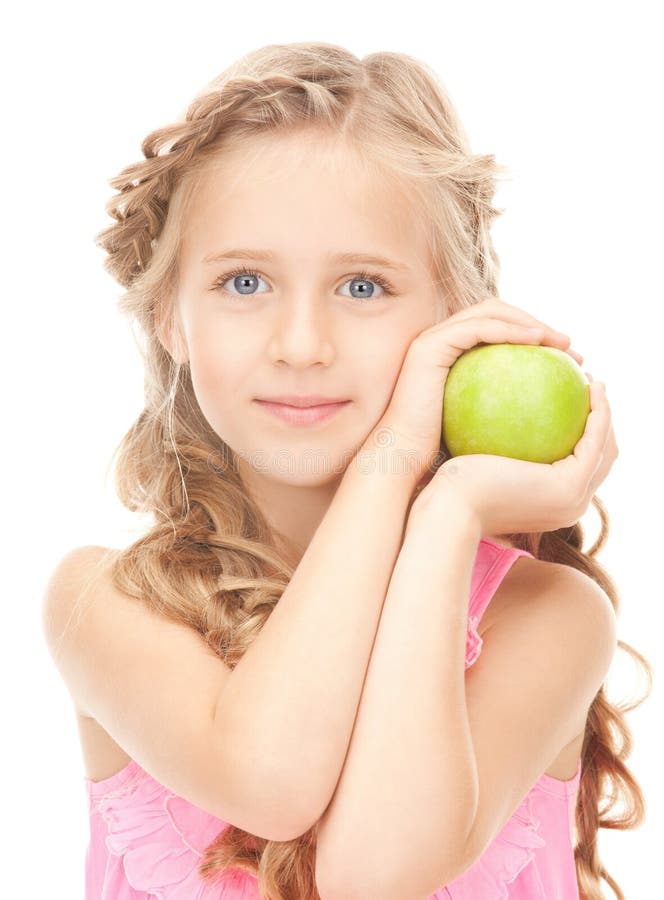 Little girl with green apple