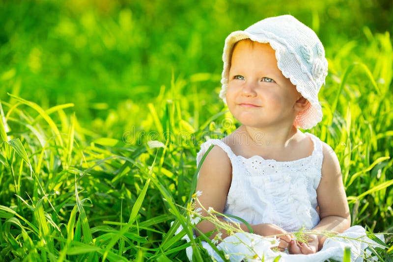 Girl in the green grass stock photo. Image of outdoor - 57535956