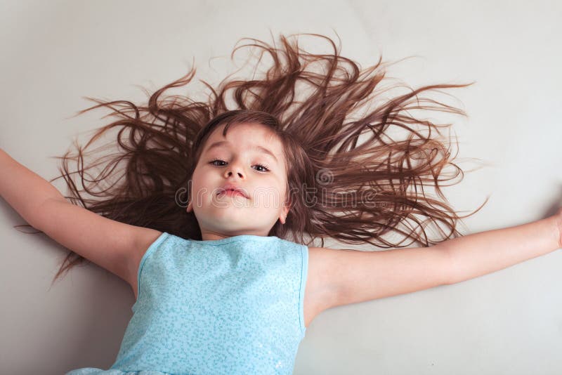 Little Girl with Hair All Over the Place Stock Photo - Image of ...