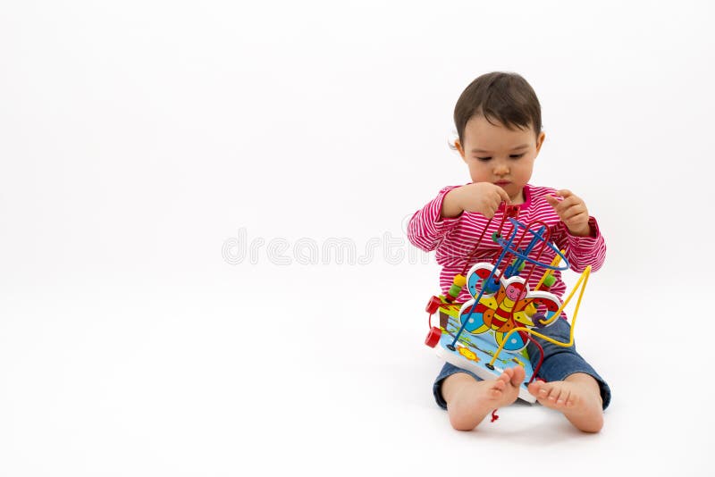Little girl happy with colorful wooden Toys isolated on white background royalty free stock images Little girl happy with colorful wooden Toys isolated on white background royalty free stock images