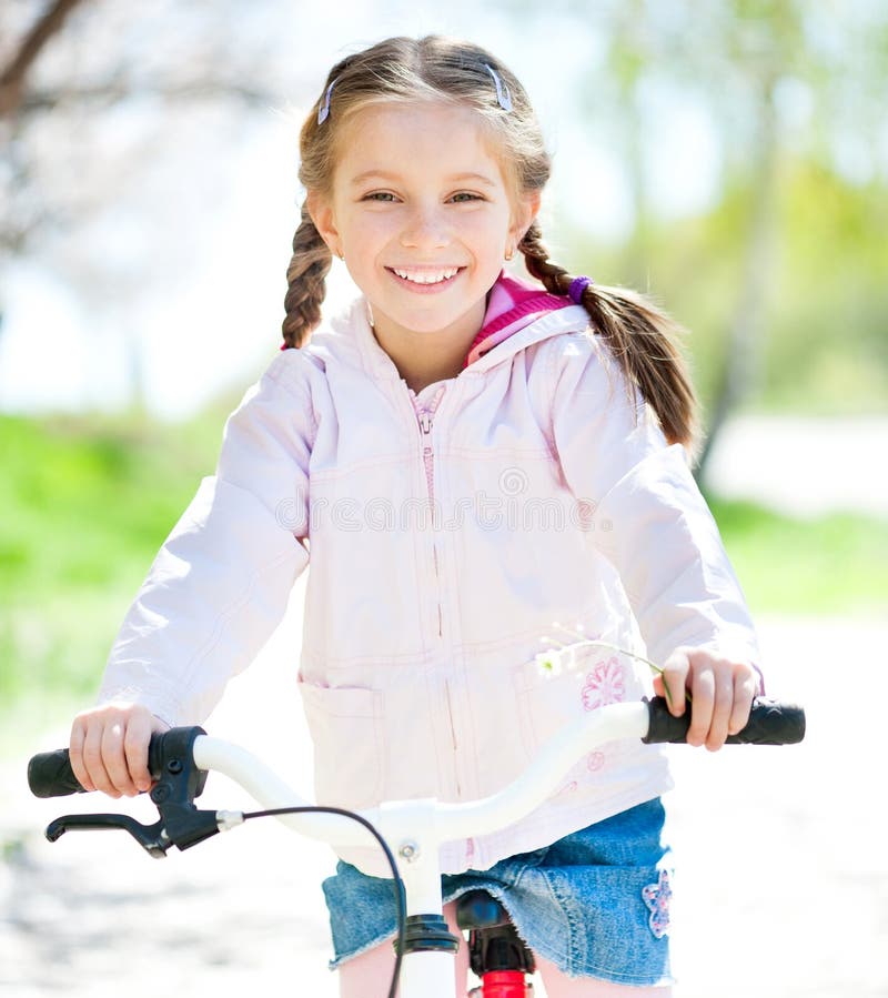 Little girl on her bike