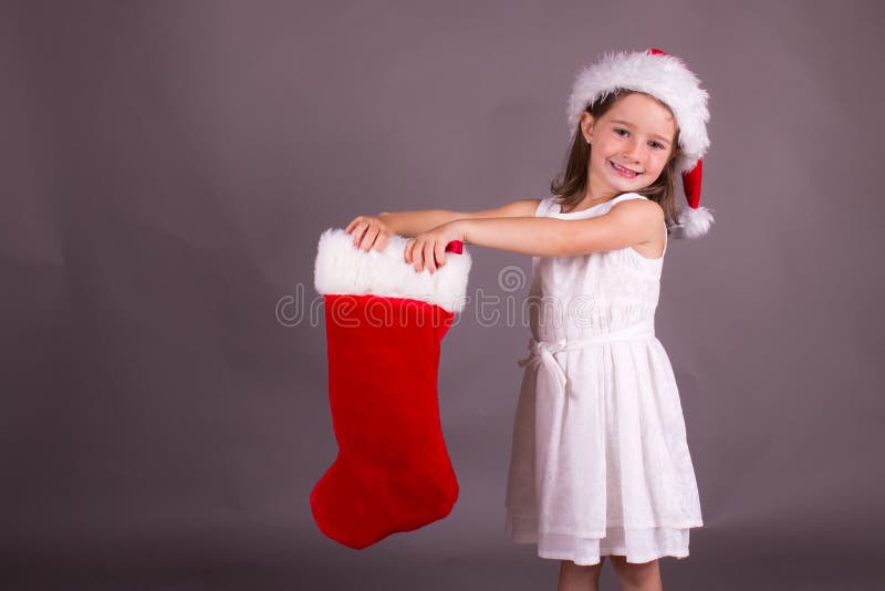 Little Girl and Her Christmas Stocking Stock Image Image of gift, celebrate 33840307