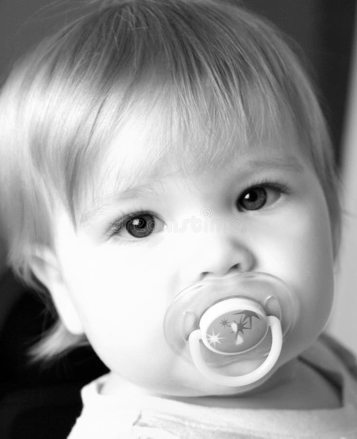 Little Girl and her pacifier in black and white