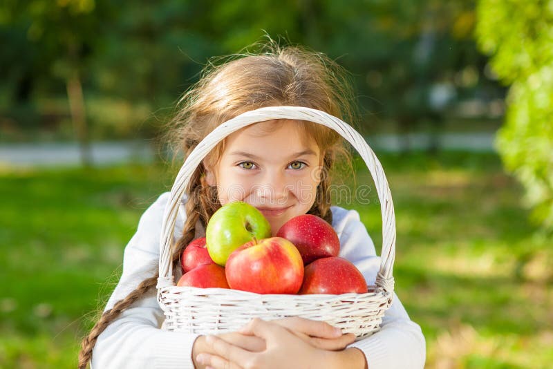 Pure Girl With Basket Of Apples Image 1
