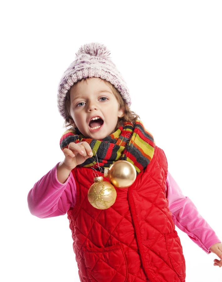 Little girl holding christmas balls