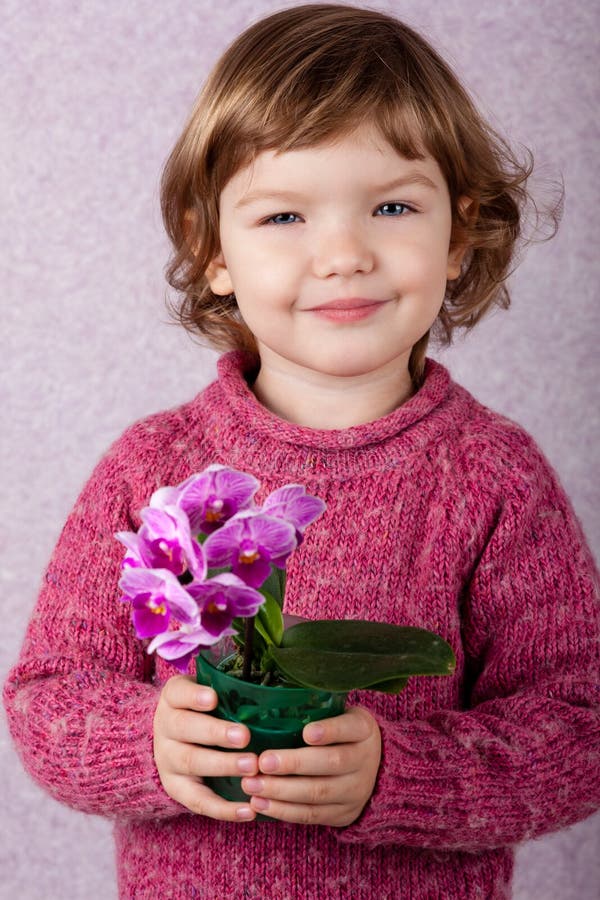 Little Girl Holding Flowers Stock Photo Image of purple, child 29617530