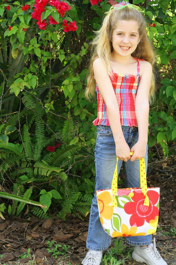 Little Girl Holding Her Bag Stock Photo Image of handbag, expressions