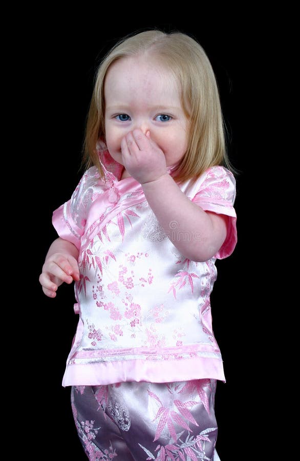 Little girl holding her nose