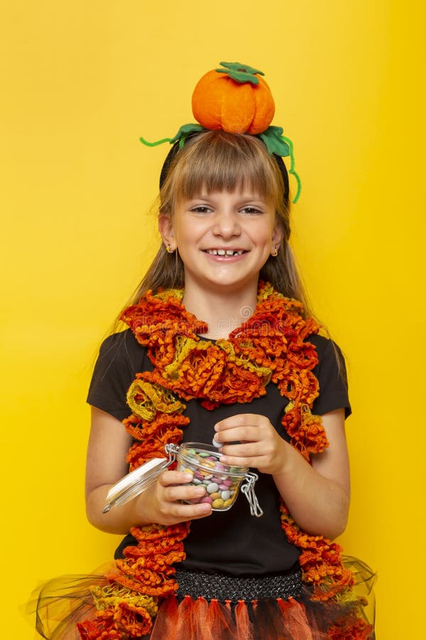 Little Girl Holding Jar of Candy for Halloween Stock Image - Image of ...