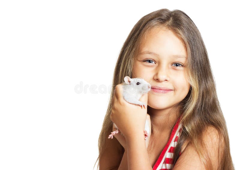 Beautiful little girl holding a pet rat