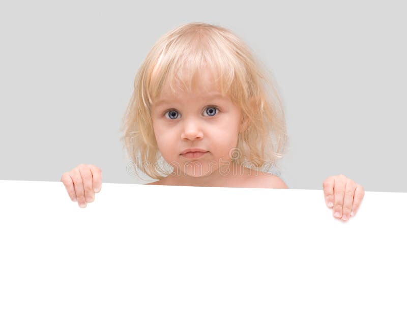 Little girl holding a white banner