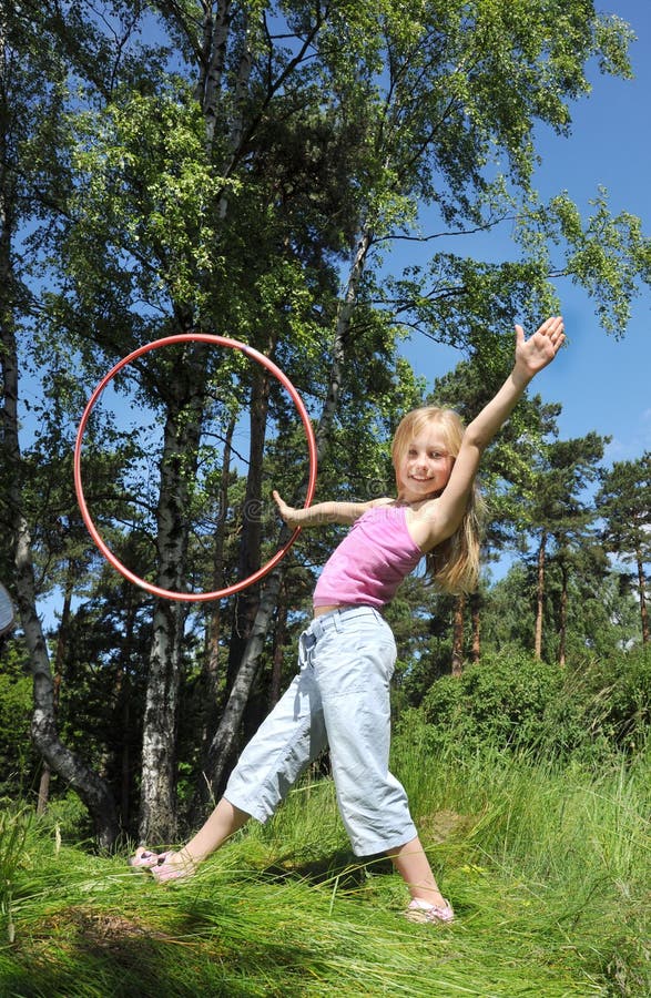 Little girl with hula hoop