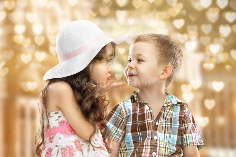 Little girl kissing boy stock photo. Image of caucasian ...