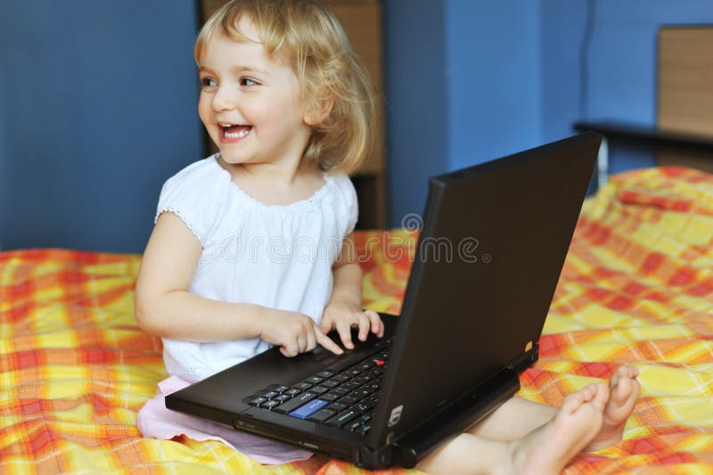 Little girl with laptop