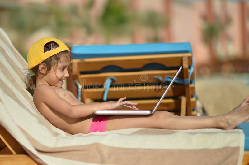 little girl with laptop