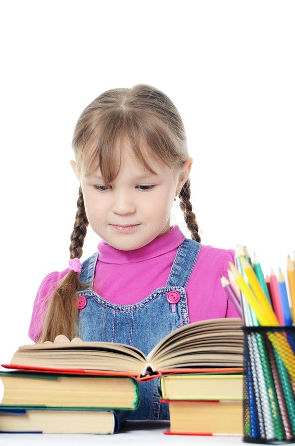 The little girl learn on white background