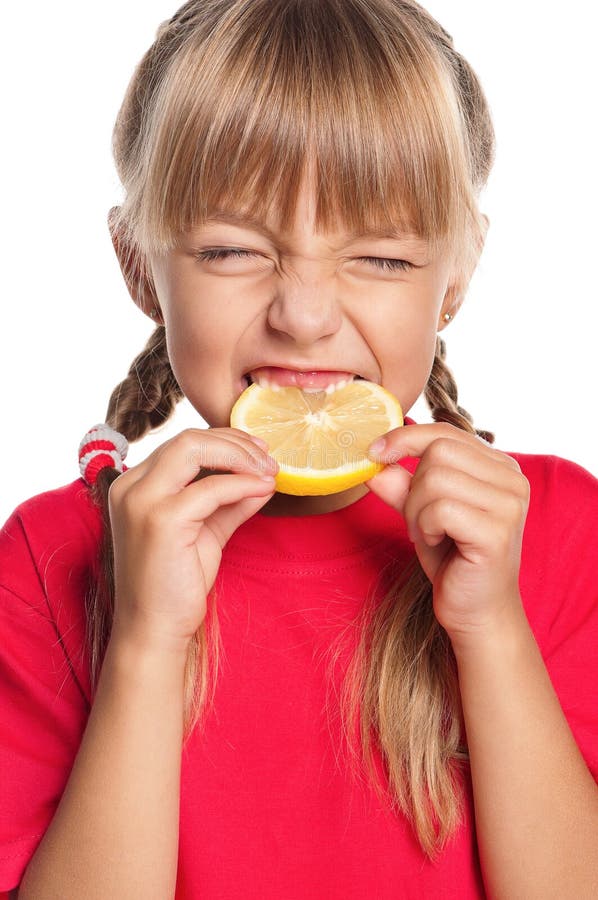 Little girl with lemon