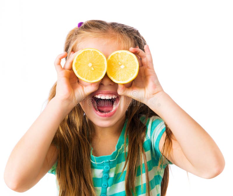 Little girl with lemon