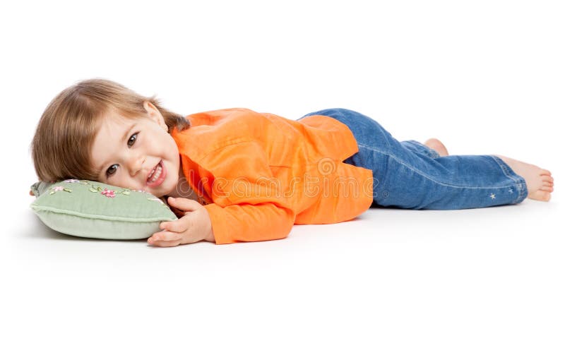 Little girl lying on the pillow