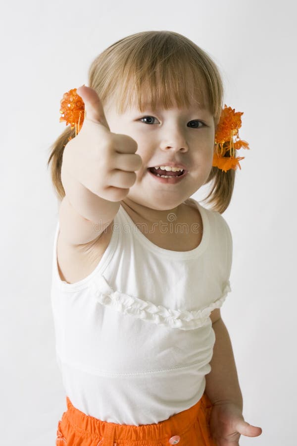 Little girl making the OK sign