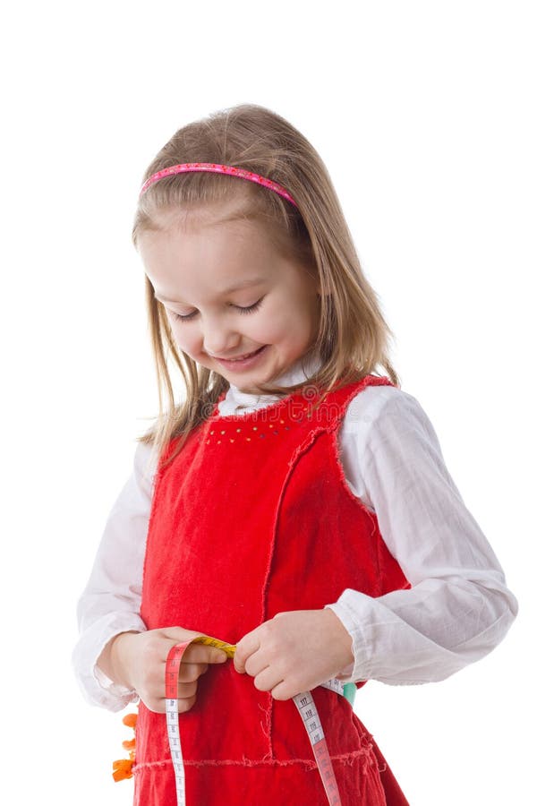 Little girl measuring waist