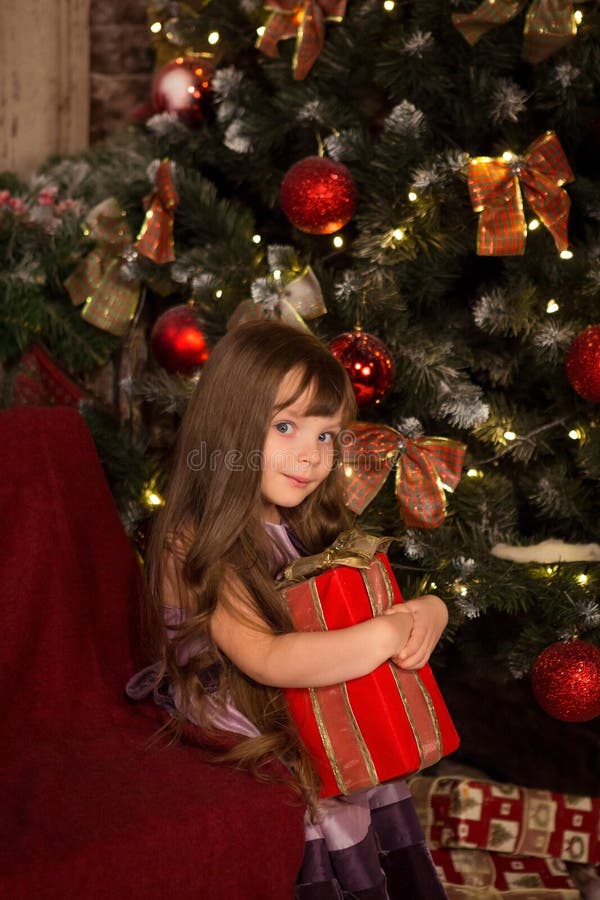 Little Girl Near a Christmas Tree Stock Photo - Image of caucasian ...