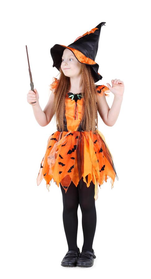 Little girl in orange costume of witch for Halloween