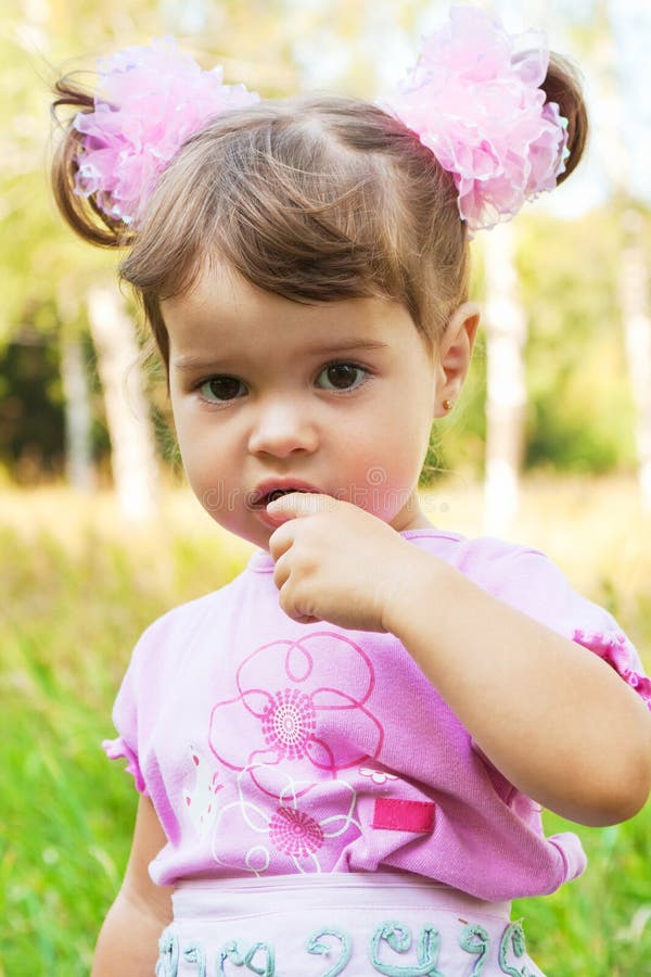 Little girl in park royalty free stock images