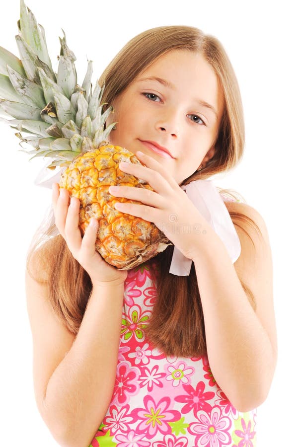 Little girl with a pineapple