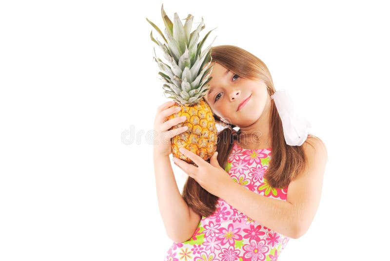 Little girl with a pineapple