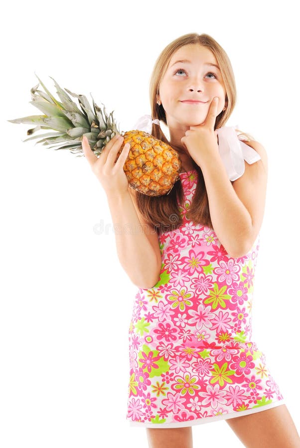 Little girl with a pineapple