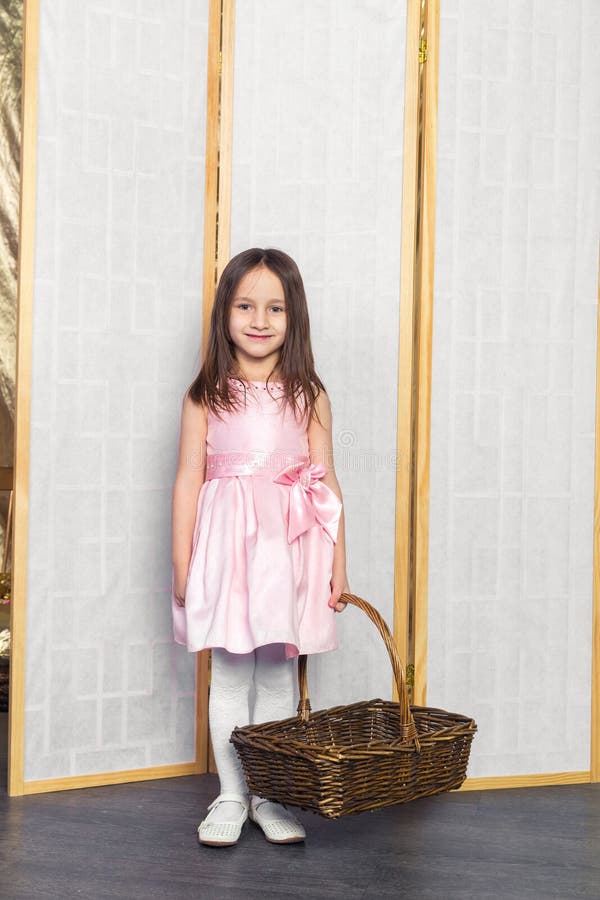 Little Girl in a Pink Dress with White Shoes Stock Image - Image of smile,  beautiful: 50242761