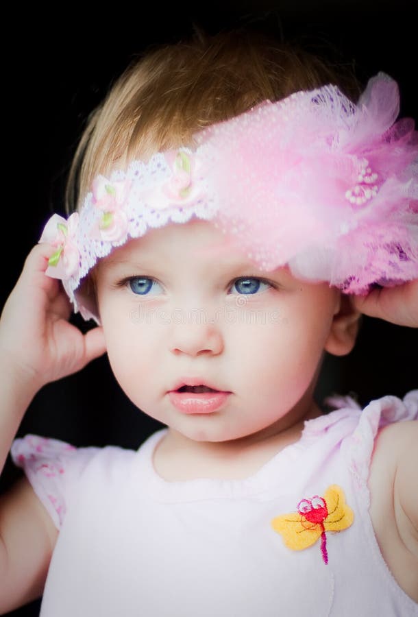 Little girl and pink headdress