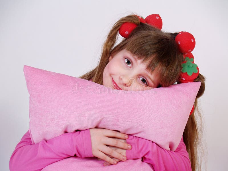 Little Girl With A Pink Pillow Stock Photo Image of face, attractive