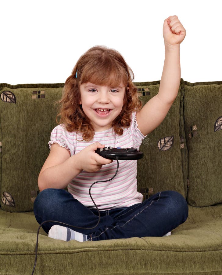 Young girl playing video games on computer after online school Stock Photo  by DC_Studio