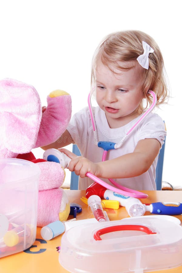 Little girl playing as doctor with stethoscope