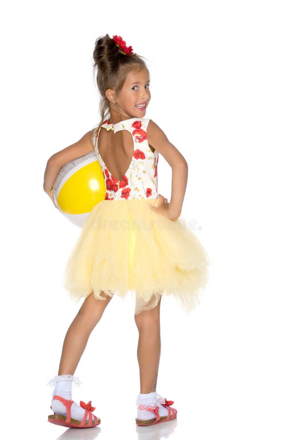 Little girl is playing with a ball stock photo Little girl is playing with a ball stock photo