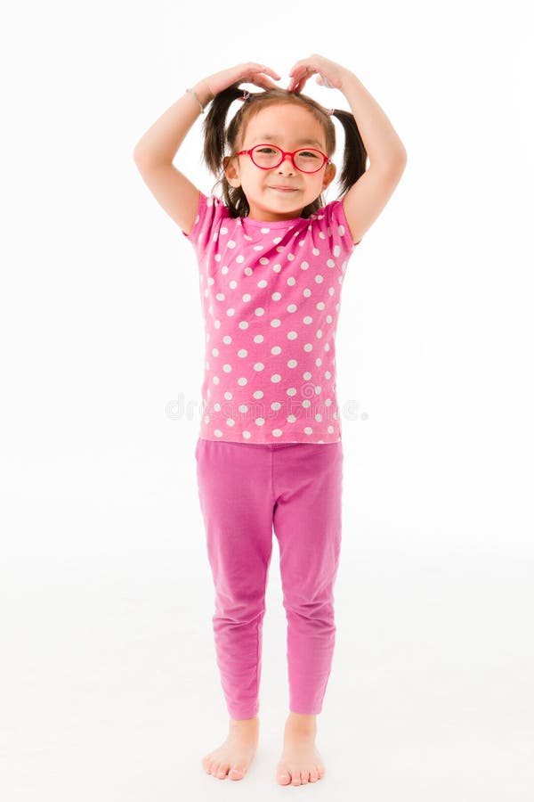 Little girl practice yoga stock image. Image of pants - 144010177