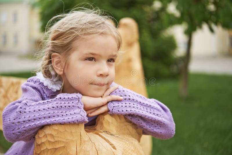Little girl pondered stock photos