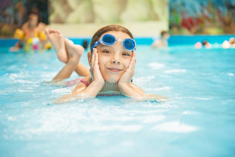 Little girl in pool royalty free stock photo